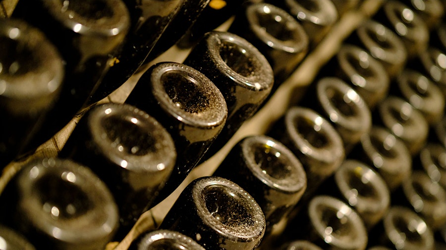 Authentic Champagnes, like these, undergo secondary fermentation in the bottle; Didier Chopin admits he simply injected CO2 into wines from outside the region.