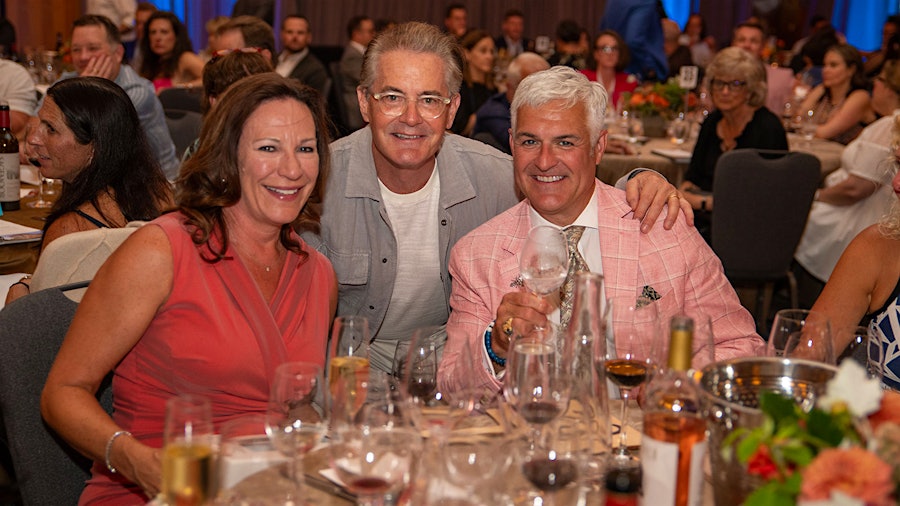 Kyle MacLachlan with Laura and Ian MacNeil, a board member of the 2026 Auction of Washington Wines.